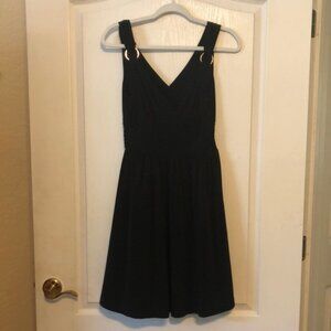 Elegant short black dress, totally lined with side zipper, size 4